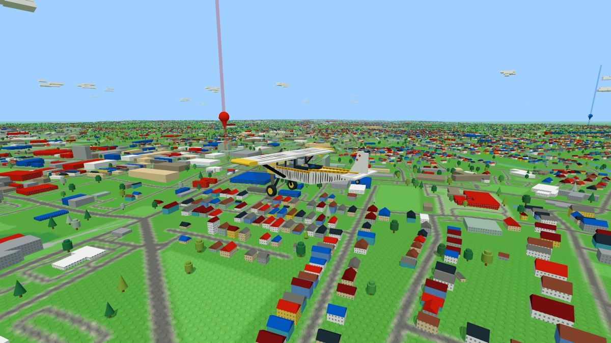 The Lego Technic bush plane flying over a brick-built Spartanburg